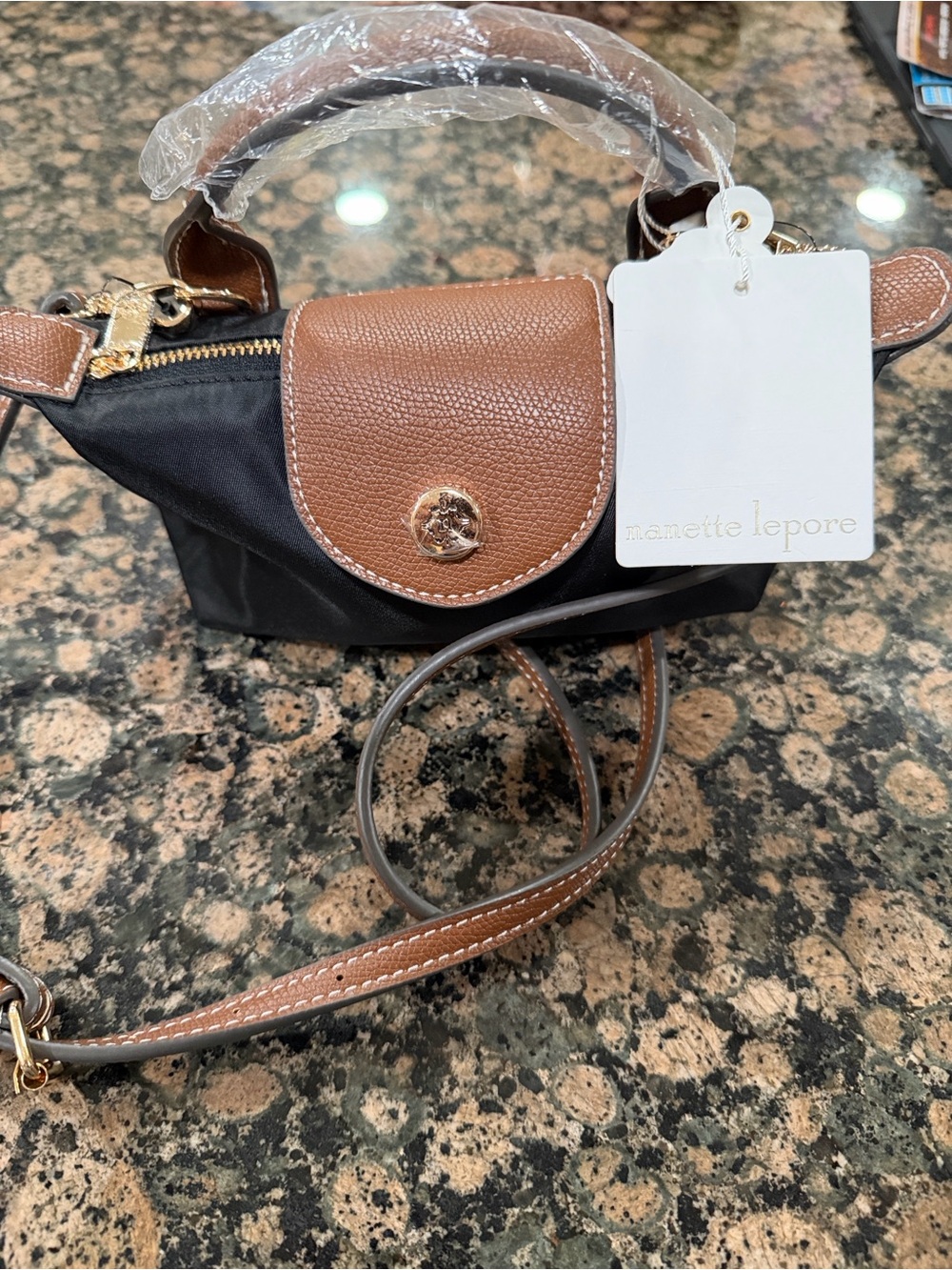 Nanette Lepore Black and Brown Crossbody Bag with Gold Hardware